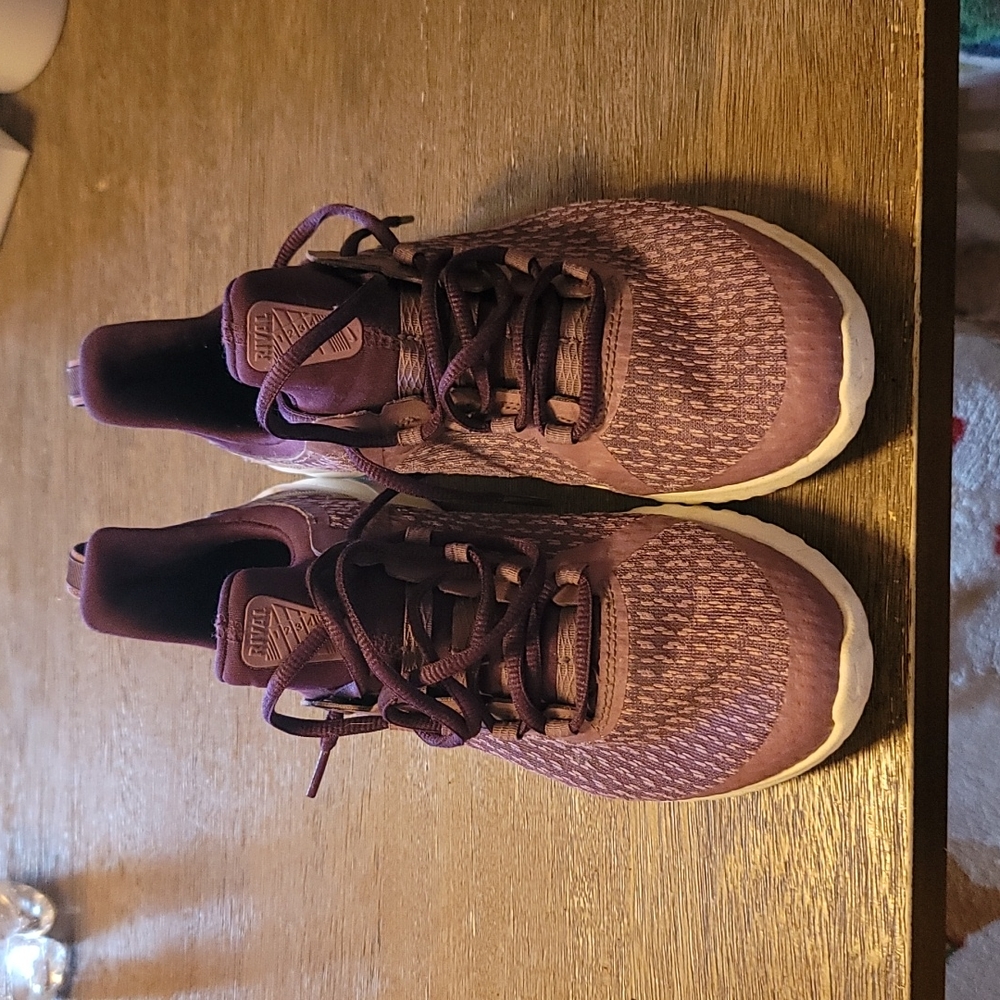 Nike rival big girl shoes.